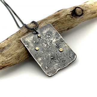 Rectangle oxidized silver necklace with three solid 18K gold dots on reticulated silver.