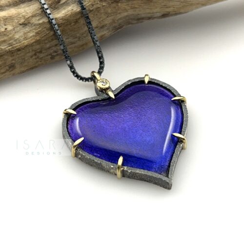 purple heart necklace with a vitreous enamel heart in silver and gold with a diamond.